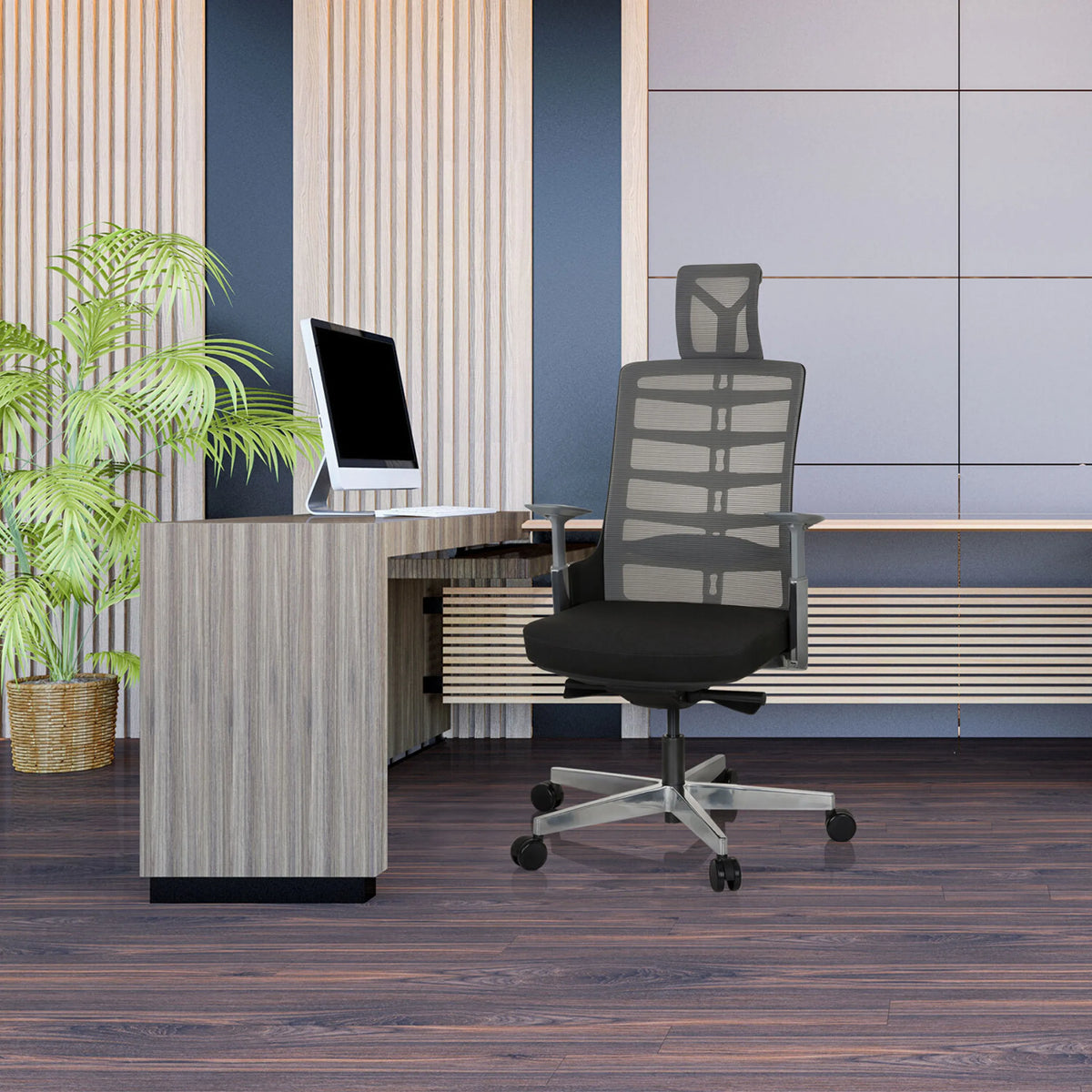 High End -toimistotuoli SKARIF värissä musta-harmaa työpöydän edessä modernissa toimistossa, valmistaja hjh OFFICE