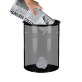 Musta CLEAN III roskakori, jossa on reikäkuvio yläosassa ja paperipallo sisällä, valmistaja hjh OFFICE