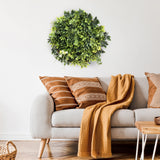 Vihreä Kasvimatto LEAFLUXE WALL 2 pyöreänä seinäkoristeena sohvan yläpuolella, valmistaja hjh LIVING