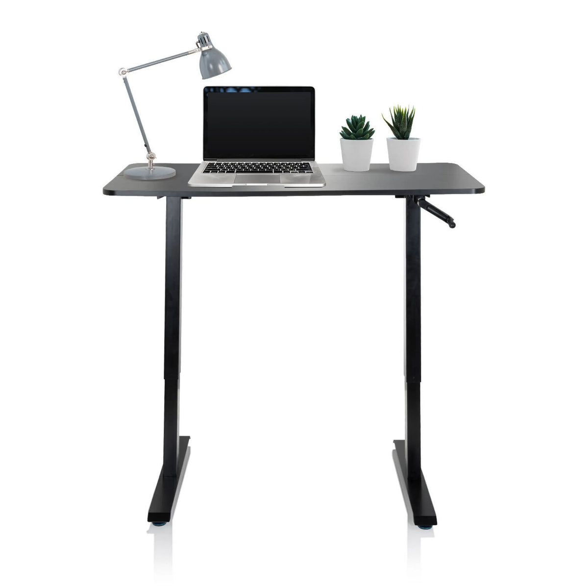Musta Seisomatyöpöytä STAND CR, jossa on kannettava tietokone, pöytälamppu ja kaksi pientä kasvia, valmistaja hjh OFFICE